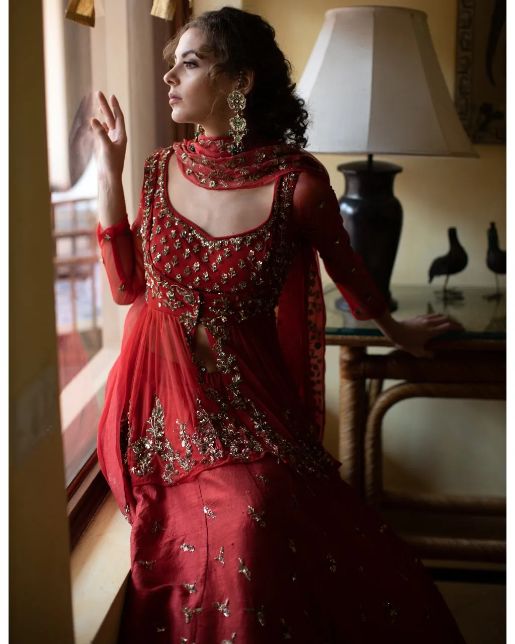 Antique Gold Sequins Raw Silk Lehenga With Peplum Work Blouse
